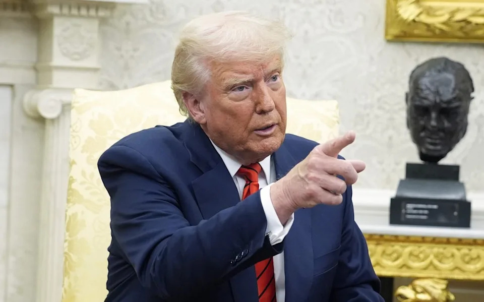Trump pressures Fed to cut rates to soften blow from tariffs