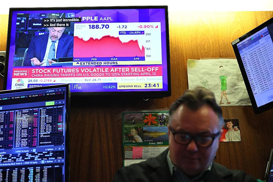 Photos show reactions at the New York Stock Exchange as Trump's tariff announcements sent markets crashing and soaring